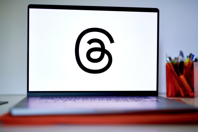 The Threads logo on a laptop arranged in the Brookl