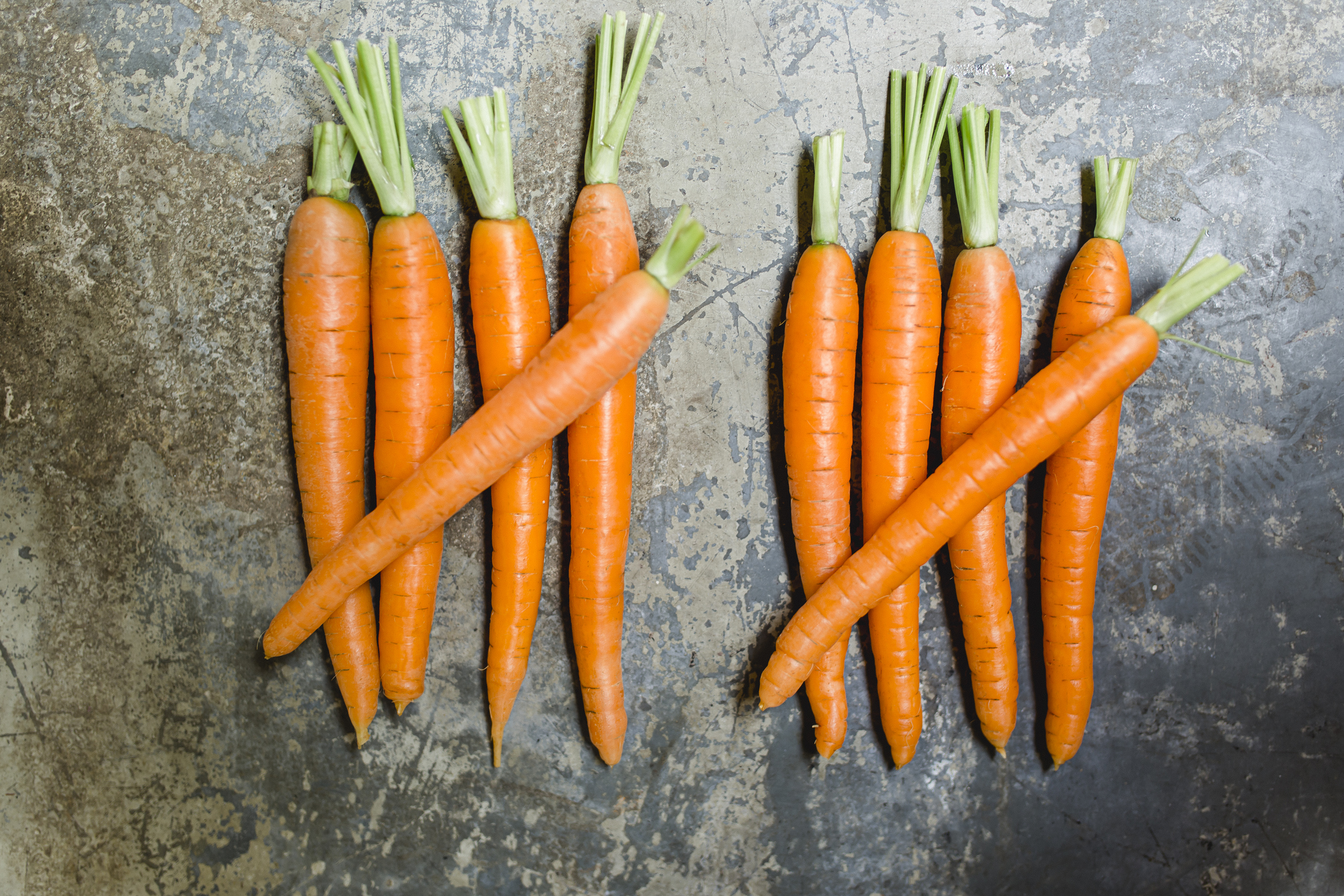 Ten carrots arranged in a tally pattern