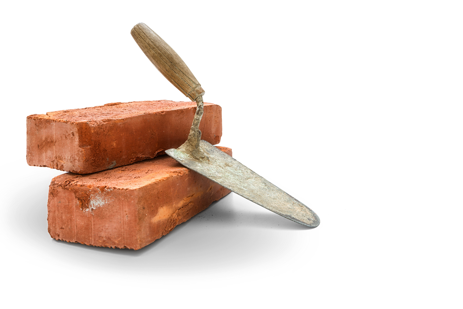 Bricks and trowel on white background, included clipping path