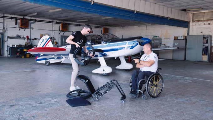 Revolve Air wheelchair in airport hangar