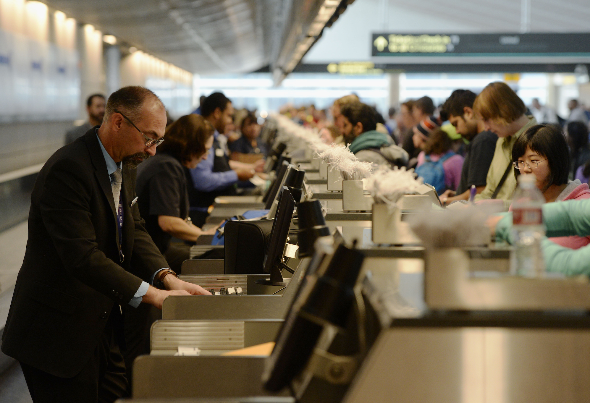 Long lines at the United Airlines ticket counter at Denver International Airport in 2015