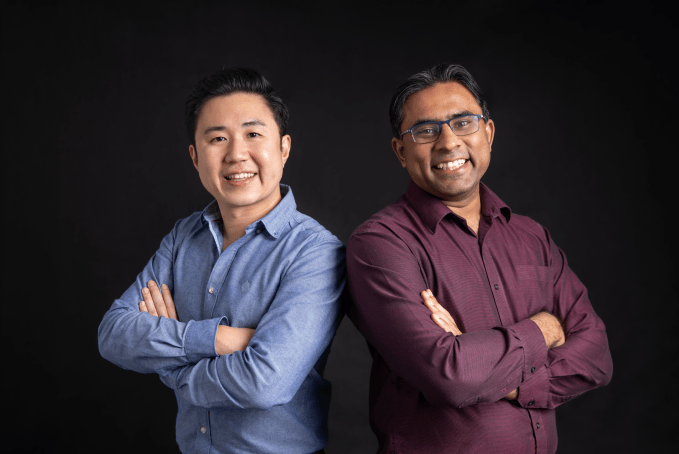 Cosmos Innovation founders Joel Li and Vijay Chandrasekhar standing against a black background.
