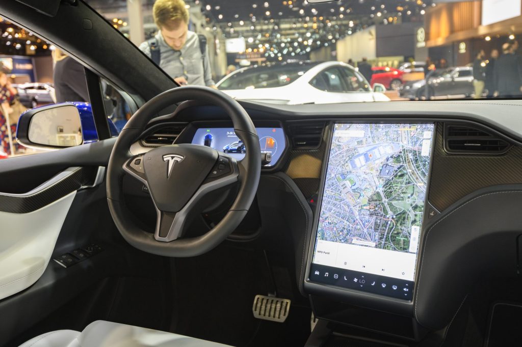 terior on a Tesla Model X full electric luxury crossover SUV car with a large touch screen and carbon look dashboard on display at Brussels Expo on January 9, 2020 in Brussels, Belgium. The Model X uses falcon wing doors for access to the second and third row seats. (Photo by Sjoerd van der Wal/Getty Images)
