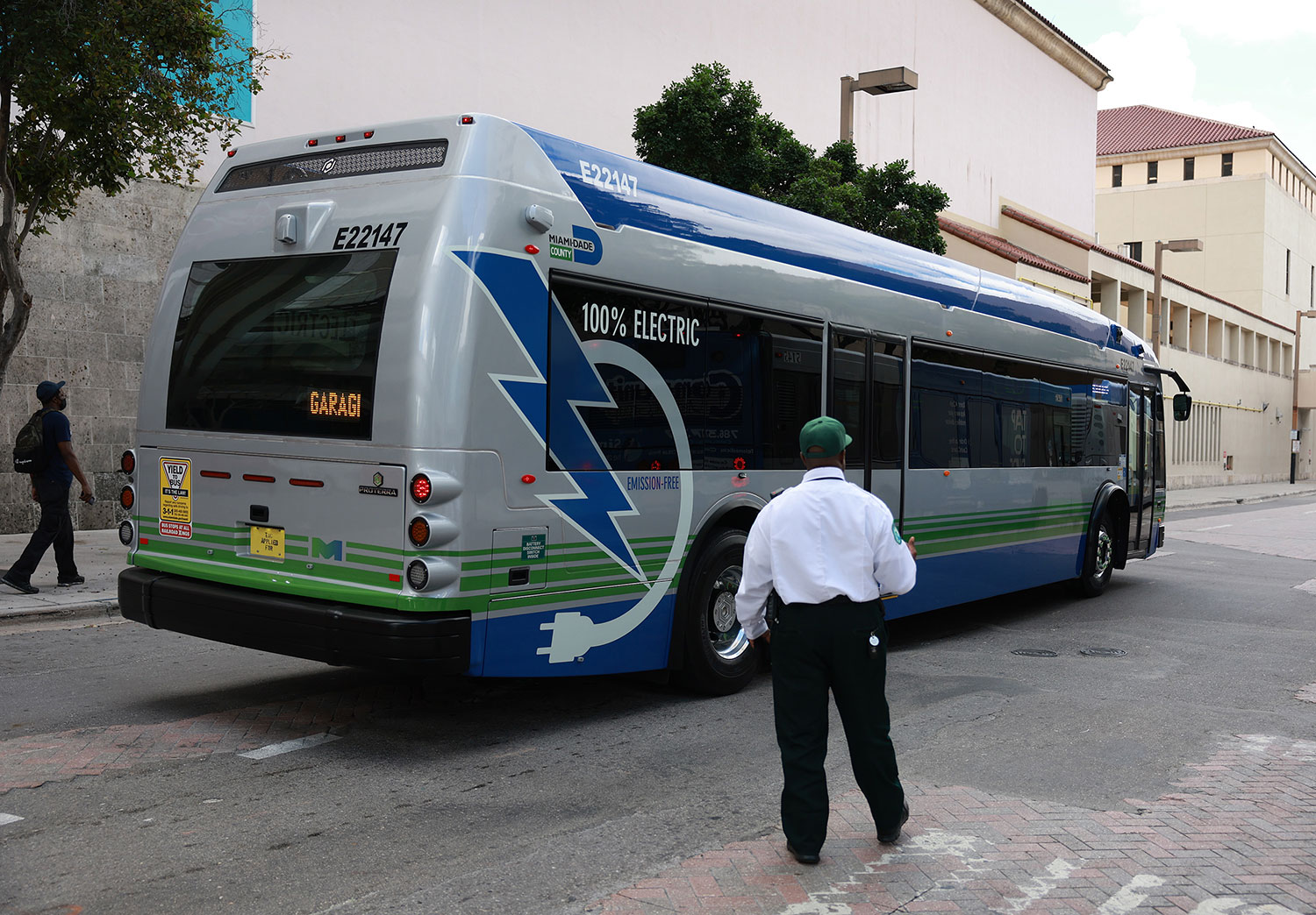 MIAMI, FL - FEBRUARY 2: A 40-foot battery-powered electric bus drives down a street in Miami, Florida on February 2, 2023. Miami-Dade County announced today that the city's transit system has begun using 75 Proterra ZX5 battery electric buses. The new vehicles advance the county's climate action strategy by reducing emissions and delivering cost savings for both transit users and residents.  (Photo by Joe Radle/Getty Images)