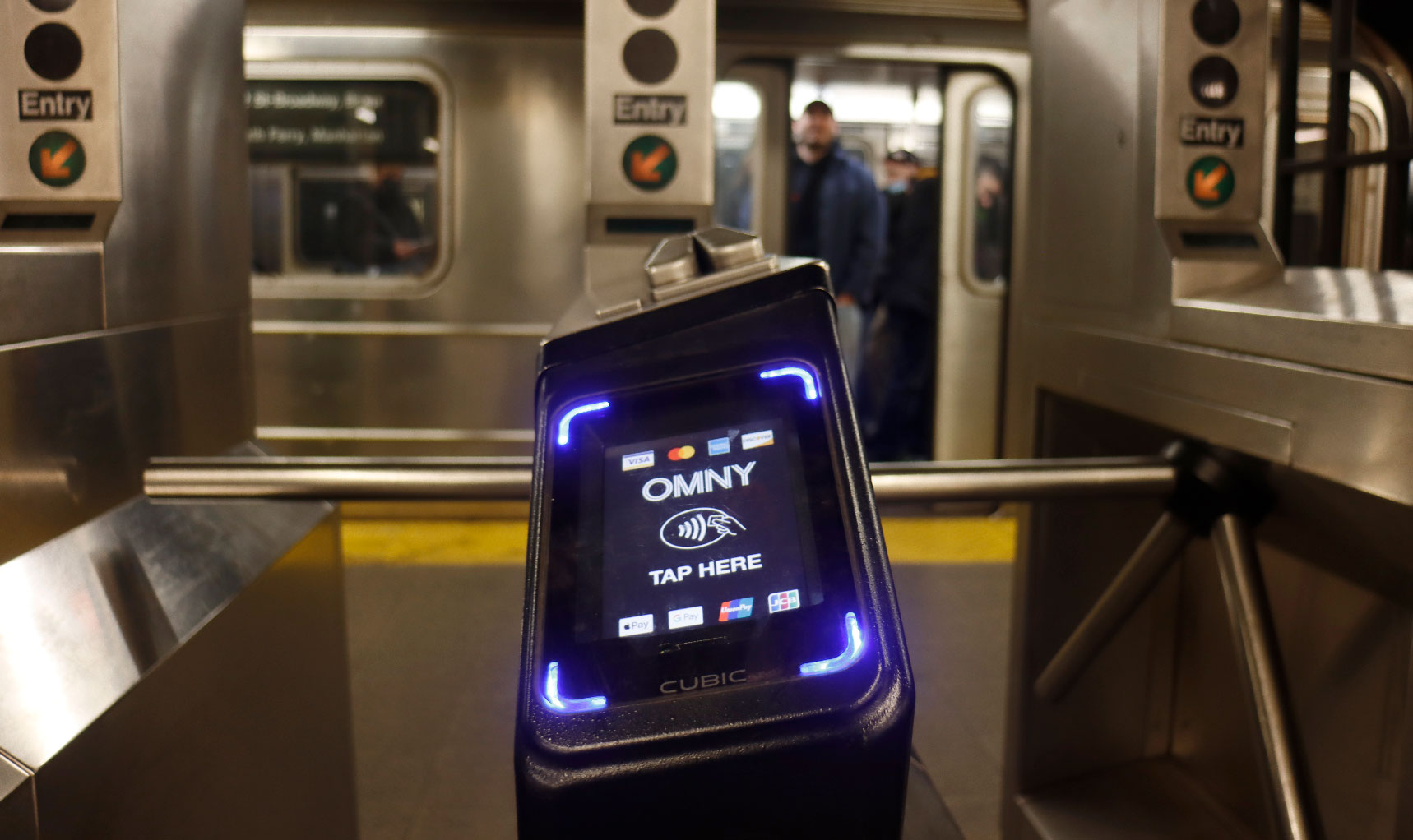 NEW YORK, NY - MARCH 5: An OMNY fare reader is pictured in front of a '1 line train at the Christopher Street subway station on March 5, 2023, in New York City. (Photo by Gary Hershorn/Getty Images)