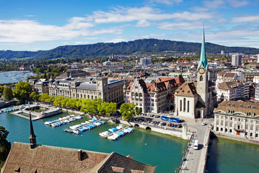 Zurich skyline and Frauenkirche, River Limmat and Lake Zurich seen from Grossmünster Church