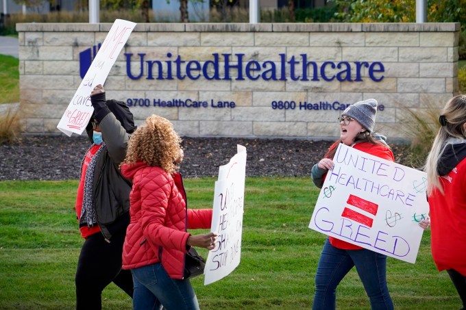 Healthcare advocates with AIDS Healthcare Foundation, from across the United States, protest at the United Healthcare Corporate office in Minnetonka, Minnesota on Tuesday, October 26, 2021